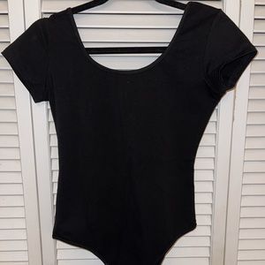 Black short sleeve bodysuit with a low scoop back